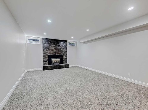 907 Kerfoot Crescent Sw, Calgary, AB - Indoor With Fireplace