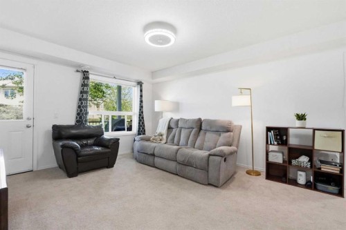 400-8 Bayside Place, Strathmore, AB - Indoor Photo Showing Living Room