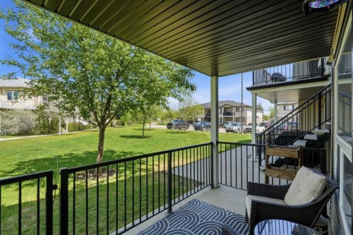 400-8 Bayside Place, Strathmore, AB - Outdoor With Deck Patio Veranda With Exterior