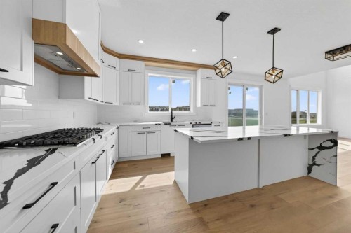 8 Ranchers Meadows, Okotoks, AB - Indoor Photo Showing Kitchen With Upgraded Kitchen