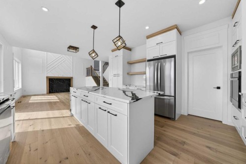 8 Ranchers Meadows, Okotoks, AB - Indoor Photo Showing Kitchen With Upgraded Kitchen