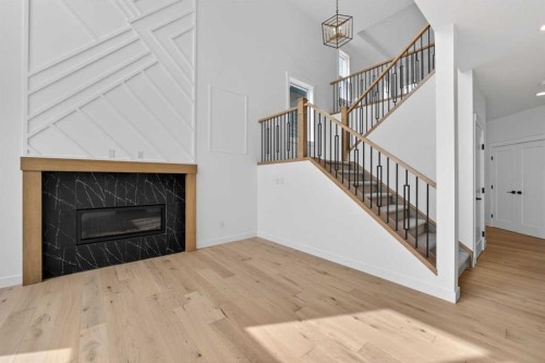 8 Ranchers Meadows, Okotoks, AB - Indoor With Fireplace