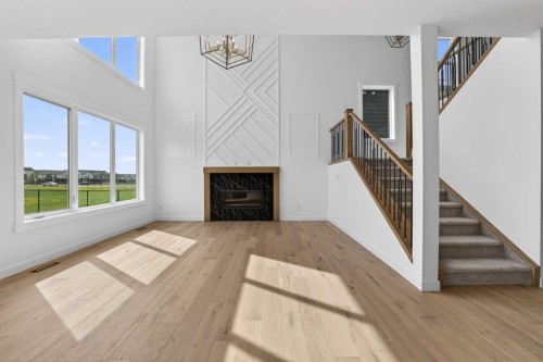8 Ranchers Meadows, Okotoks, AB - Indoor With Fireplace
