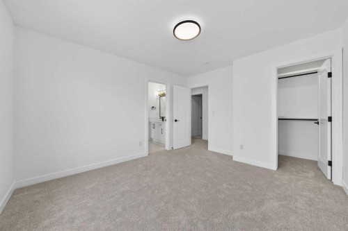 8 Ranchers Meadows, Okotoks, AB - Indoor Photo Showing Other Room