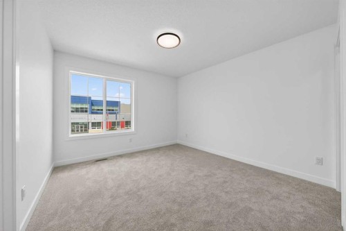8 Ranchers Meadows, Okotoks, AB - Indoor Photo Showing Other Room