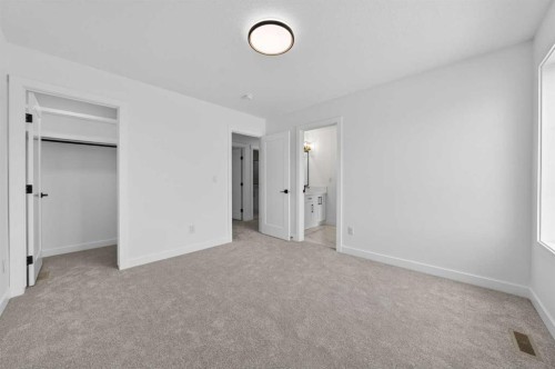 8 Ranchers Meadows, Okotoks, AB - Indoor Photo Showing Other Room