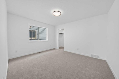 8 Ranchers Meadows, Okotoks, AB - Indoor Photo Showing Other Room