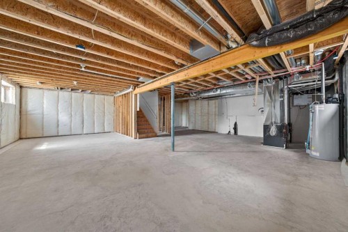 8 Ranchers Meadows, Okotoks, AB - Indoor Photo Showing Basement