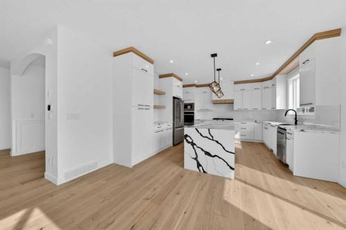 8 Ranchers Meadows, Okotoks, AB - Indoor Photo Showing Kitchen