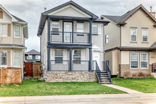 1066 Taradale Drive Ne, Calgary, AB - Outdoor With Balcony With Facade