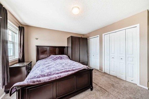 1066 Taradale Drive Ne, Calgary, AB - Indoor Photo Showing Bedroom