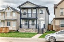 1066 Taradale Drive Ne, Calgary, AB  - Outdoor With Balcony With Facade 