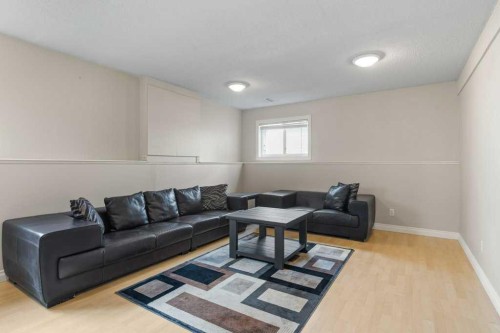 202 Willowbrook Close Nw, Airdrie, AB - Indoor Photo Showing Living Room