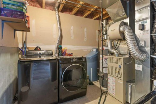 202 Willowbrook Close Nw, Airdrie, AB - Indoor Photo Showing Laundry Room
