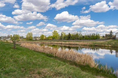 202 Willowbrook Close Nw, Airdrie, AB - Outdoor With Body Of Water With View