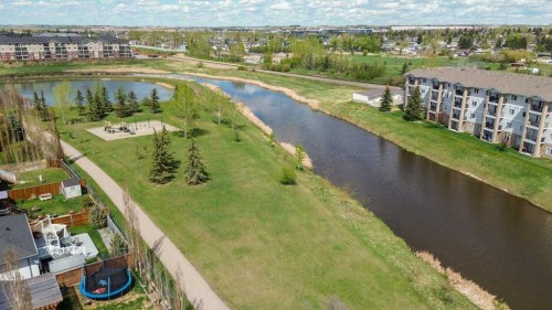 202 Willowbrook Close Nw, Airdrie, AB - Outdoor With Body Of Water With View