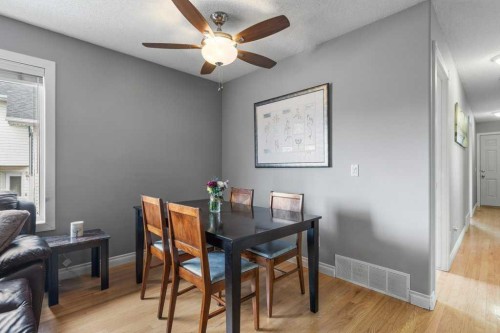202 Willowbrook Close Nw, Airdrie, AB - Indoor Photo Showing Dining Room