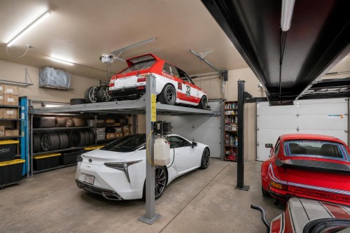 19 Coach Gate Way Sw, Calgary, AB - Indoor Photo Showing Garage