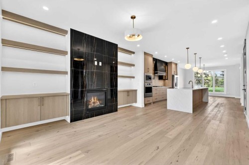 8519 48 Avenue Nw, Calgary, AB - Indoor Photo Showing Other Room With Fireplace