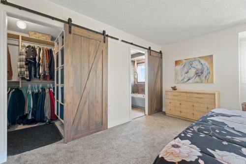 43 Westridge Drive, Okotoks, AB - Indoor Photo Showing Bedroom