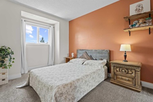 43 Westridge Drive, Okotoks, AB - Indoor Photo Showing Bedroom