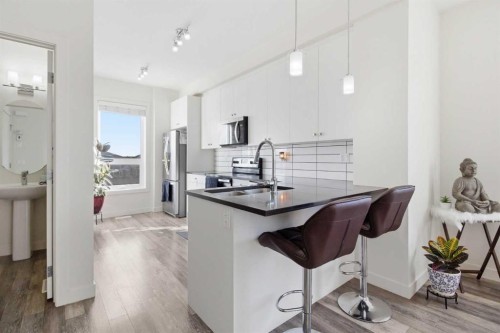 402-11 Evanscrest Mews Nw, Calgary, AB - Indoor Photo Showing Kitchen With Upgraded Kitchen