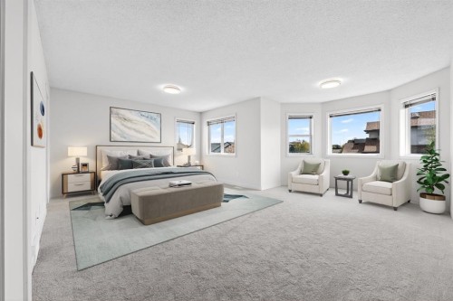 240 Cove Drive, Chestermere, AB - Indoor Photo Showing Bedroom