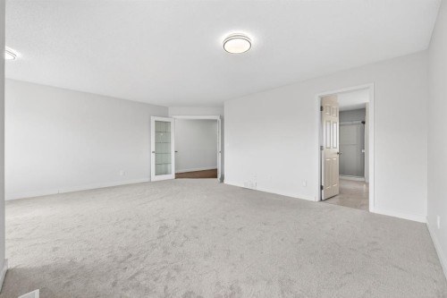 240 Cove Drive, Chestermere, AB - Indoor Photo Showing Other Room