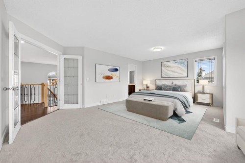 240 Cove Drive, Chestermere, AB - Indoor Photo Showing Bedroom
