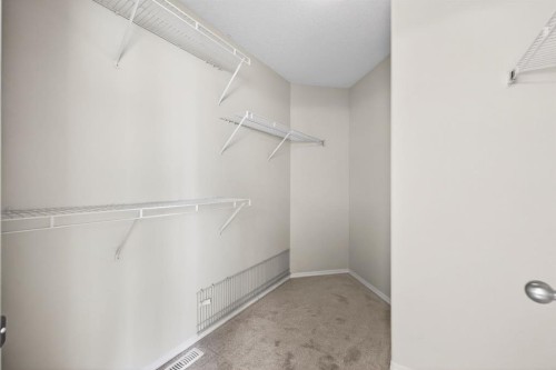 240 Cove Drive, Chestermere, AB - Indoor With Storage