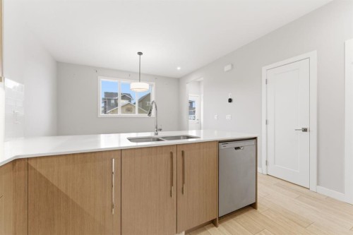 1060 West Lakeview Drive, Chestermere, AB - Indoor Photo Showing Kitchen With Double Sink