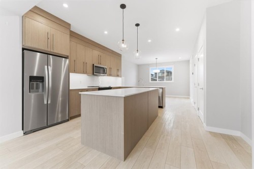 1060 West Lakeview Drive, Chestermere, AB - Indoor Photo Showing Kitchen With Stainless Steel Kitchen With Upgraded Kitchen