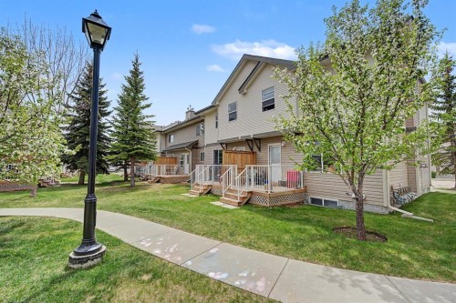 65 Royal Birch Villas Nw, Calgary, AB - Outdoor With Deck Patio Veranda