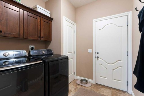 2193 High Country Rise Nw, High River, AB - Indoor Photo Showing Laundry Room