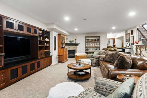 2193 High Country Rise Nw, High River, AB - Indoor Photo Showing Living Room With Fireplace