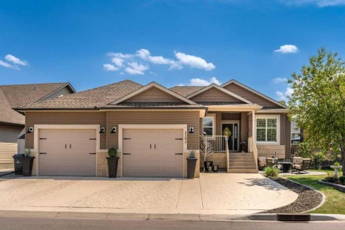 2193 High Country Rise Nw, High River, AB - Outdoor With Facade