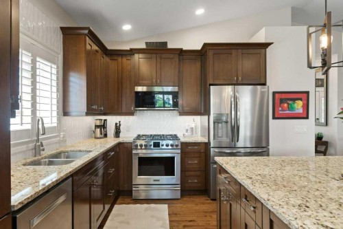 2193 High Country Rise Nw, High River, AB - Indoor Photo Showing Kitchen With Double Sink With Upgraded Kitchen