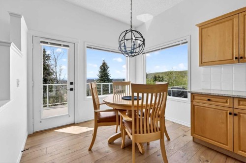 18 Eagleview Place, Cochrane, AB - Indoor Photo Showing Dining Room