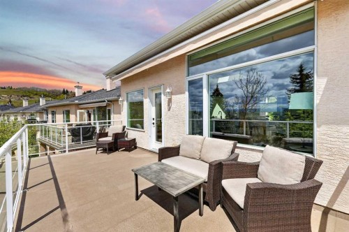 18 Eagleview Place, Cochrane, AB - Outdoor With Deck Patio Veranda With Exterior