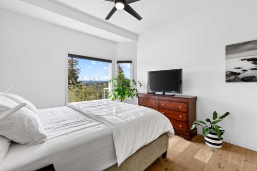 18 Eagleview Place, Cochrane, AB - Indoor Photo Showing Bedroom