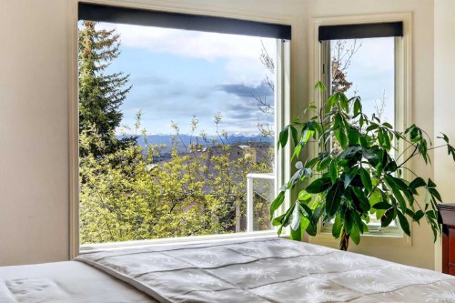 18 Eagleview Place, Cochrane, AB - Indoor Photo Showing Bedroom
