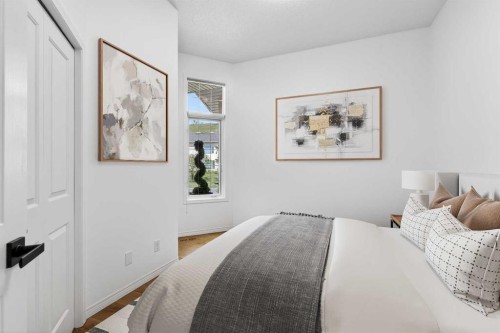 18 Eagleview Place, Cochrane, AB - Indoor Photo Showing Bedroom