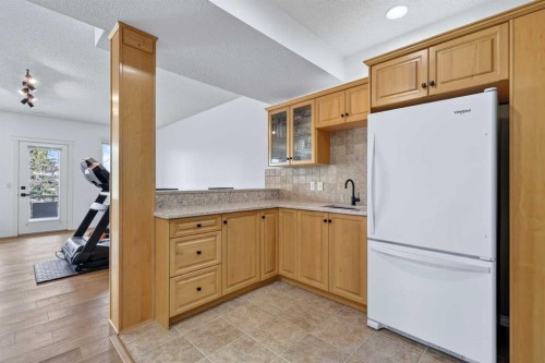 18 Eagleview Place, Cochrane, AB - Indoor Photo Showing Kitchen