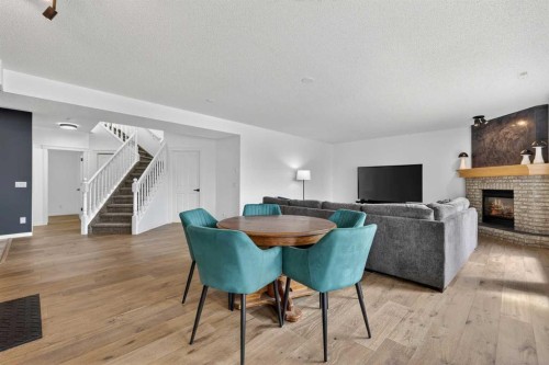 18 Eagleview Place, Cochrane, AB - Indoor With Fireplace