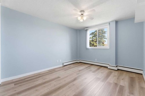 8C-80 Galbraith Drive Sw, Calgary, AB - Indoor Photo Showing Other Room