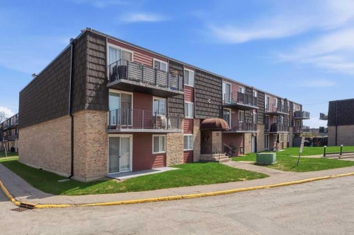 8C-80 Galbraith Drive Sw, Calgary, AB - Outdoor With Balcony