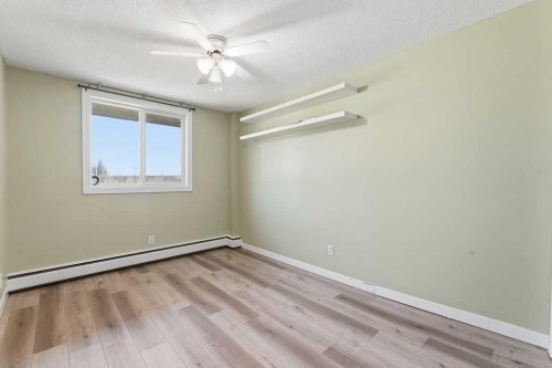 8C-80 Galbraith Drive Sw, Calgary, AB - Indoor Photo Showing Other Room