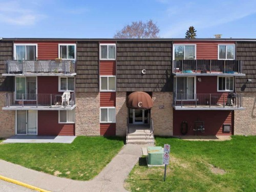8C-80 Galbraith Drive Sw, Calgary, AB - Outdoor With Balcony With Facade
