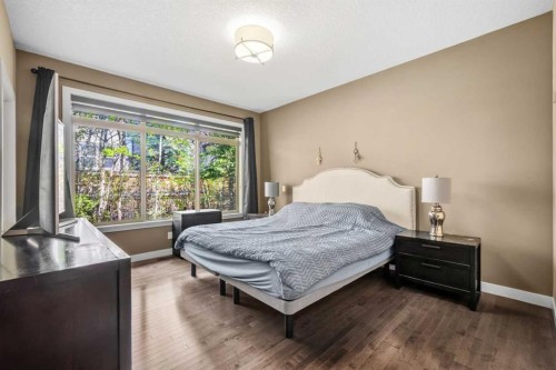 63 Cortina Villas Sw, Calgary, AB - Indoor Photo Showing Bedroom
