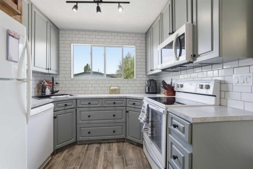 865 Queensland Drive Se, Calgary, AB - Indoor Photo Showing Kitchen